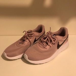 Rose colored Nikes with minimal use!